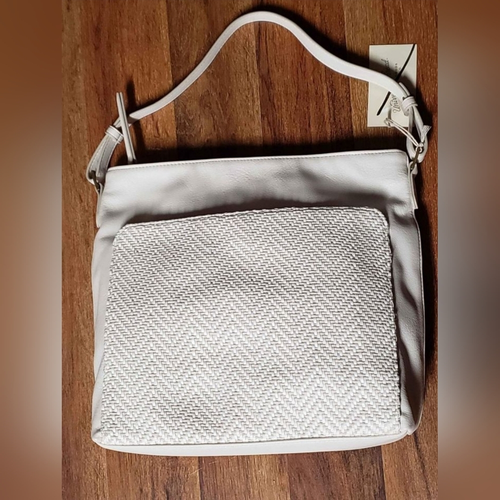 universal thread purse NWT Cream colored